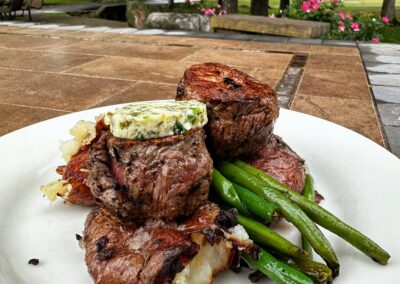 7oz steak with crushed potatoes, haricot verts, and mediterranean compound butter