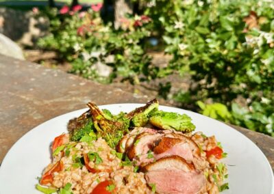Seared Duck Breast Over Farro With Blistered Tomatoes and Broccolini